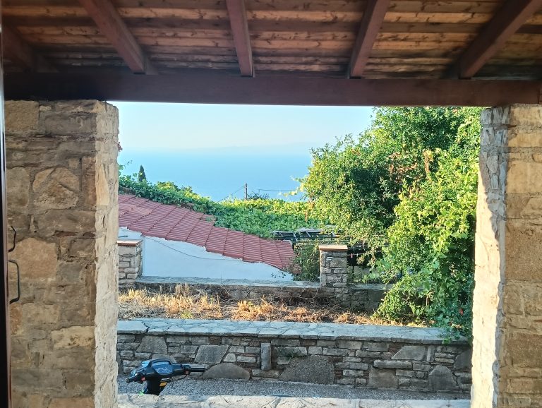 Unique Building Plot with Renovated House in the Heart of Vourliotes